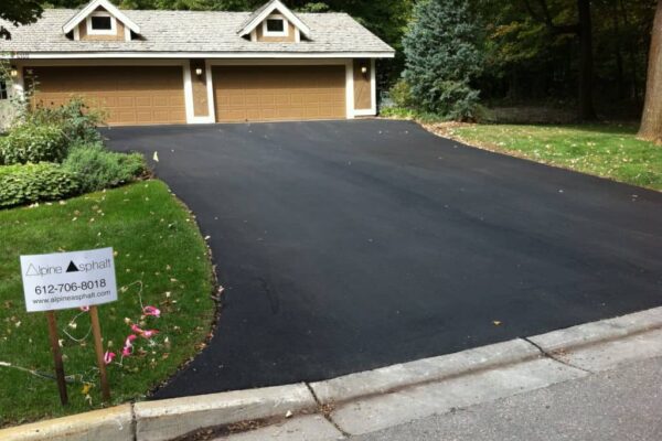 How long does it take Asphalt Sealcoating to dry?